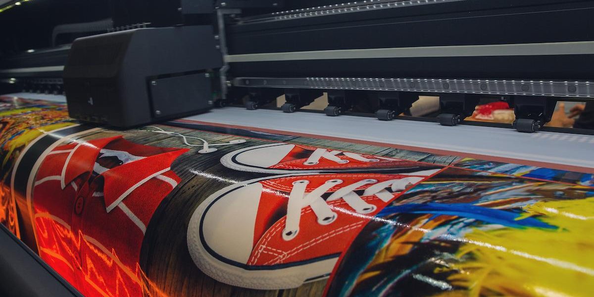 Large format printing machine in operation. Industry